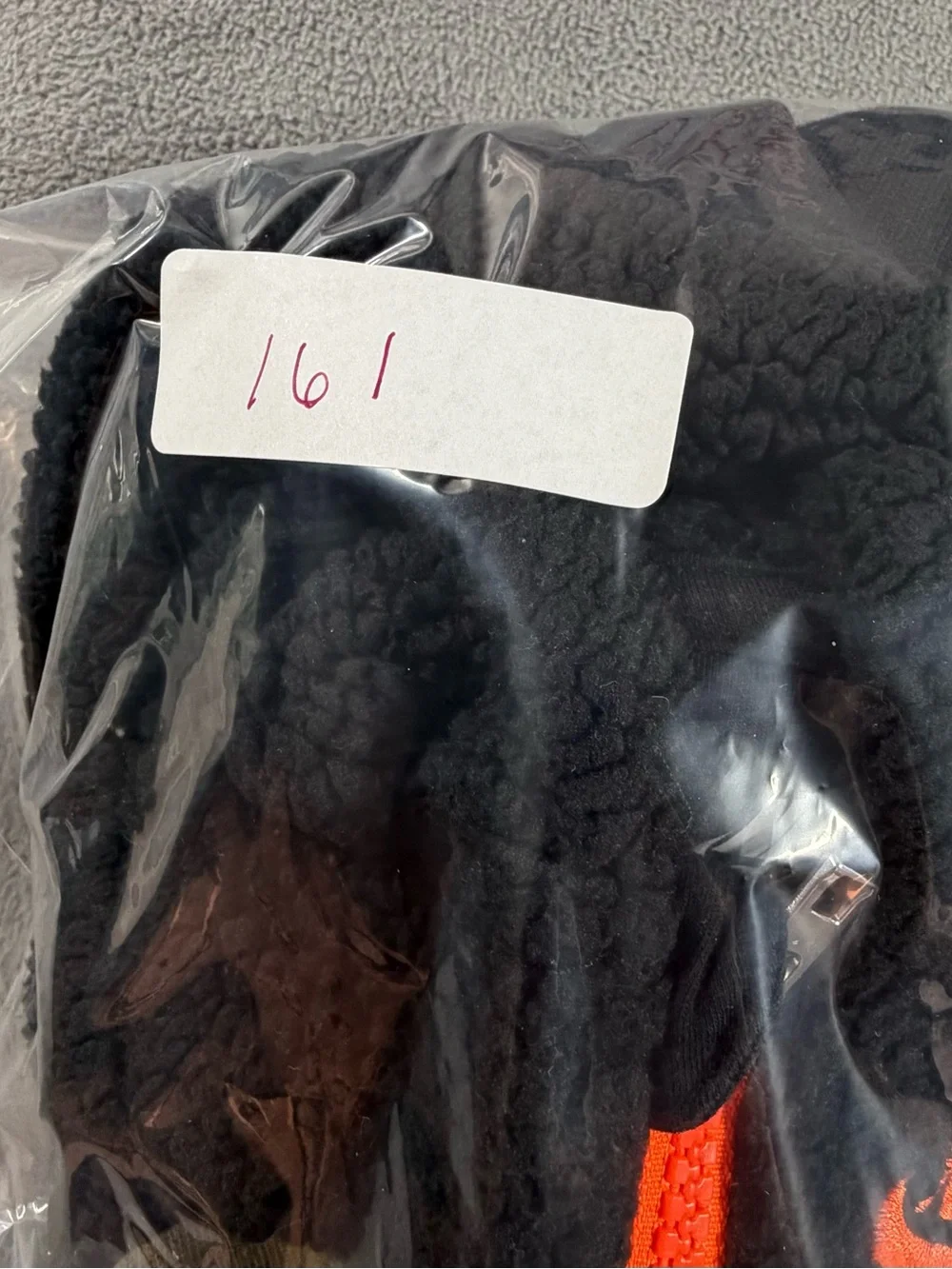 Nike Black Sherpa One-Piece with Olive Sleeves and Orange Zip